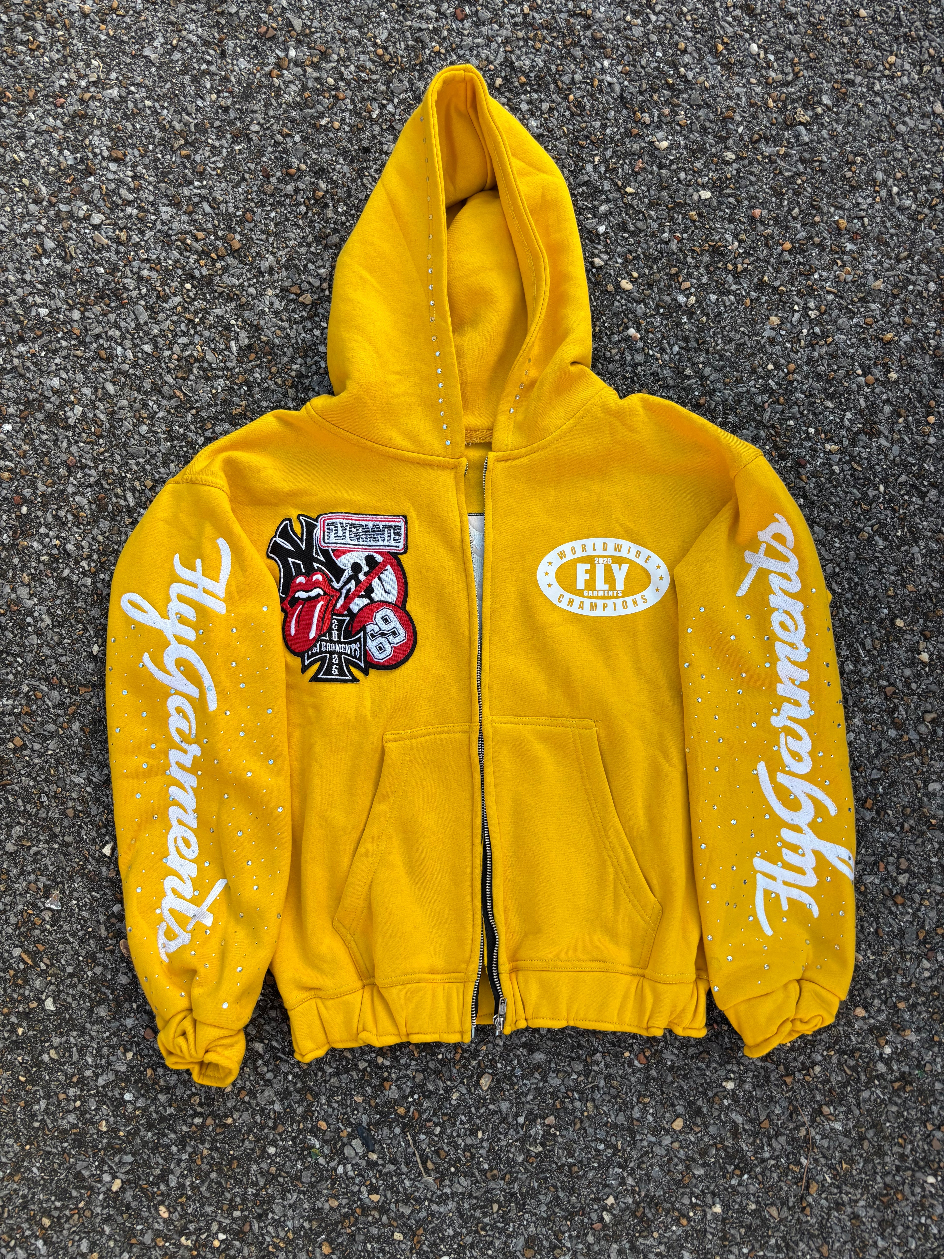 FLYGARMNTS WRLDWDE ZIP UP